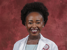 Chege is college's 11th NHSC scholar